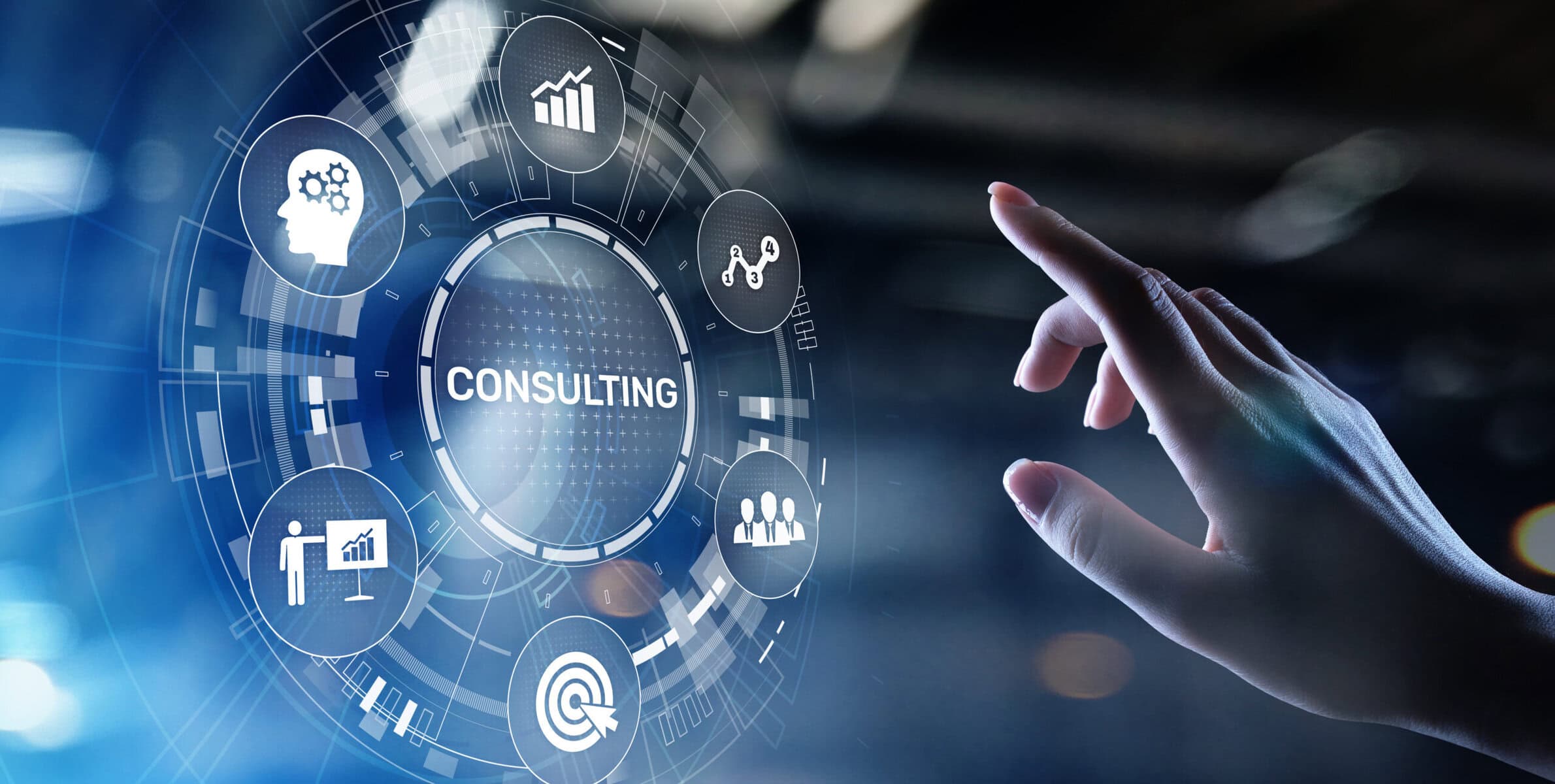 Hand with finger reaching to touch consulting screen.